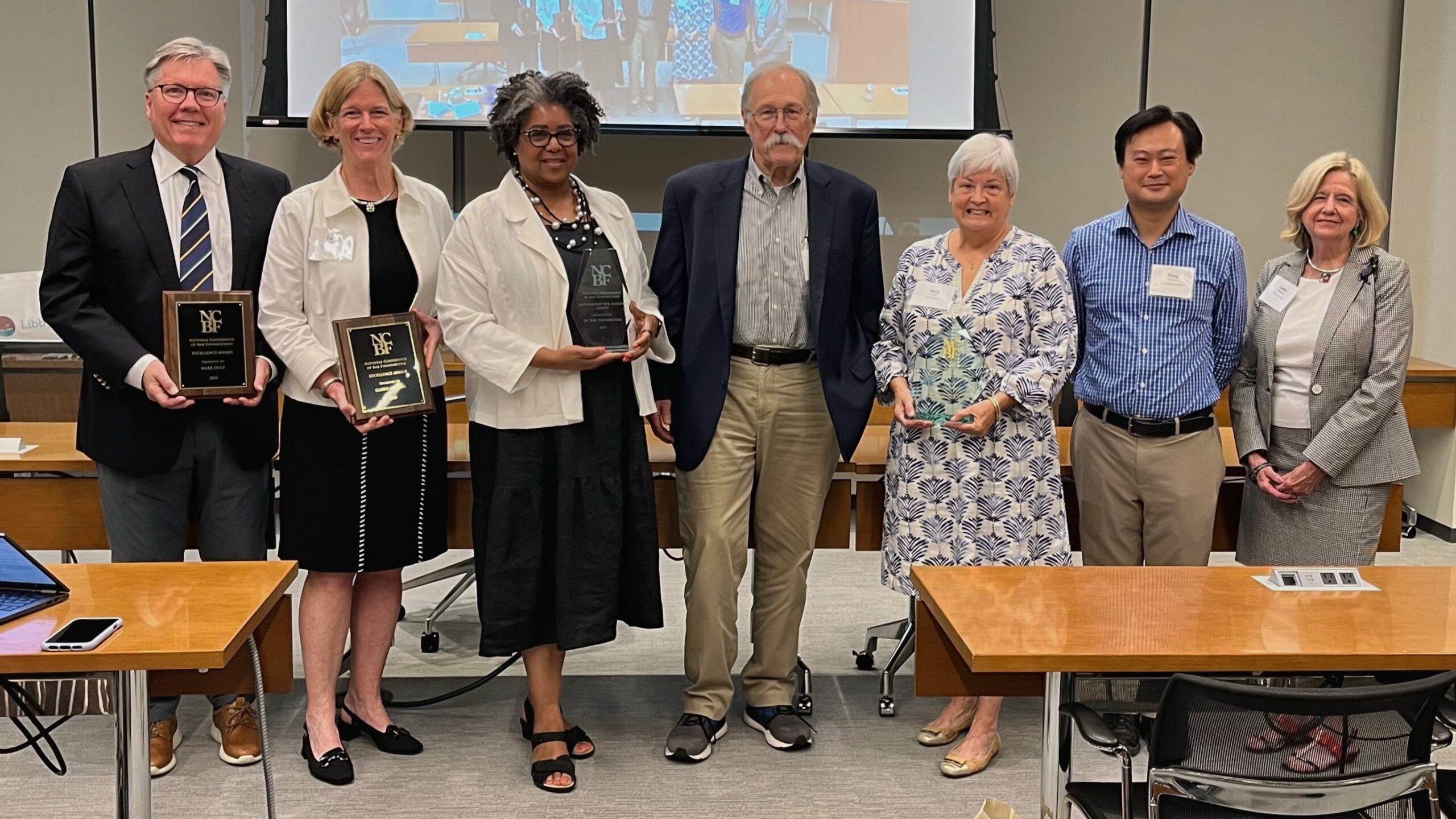 From Left to Right, Mark Holt, Caryn McNeill, Kirra Jarrett, Judge Carl Butkus, Mary Groth, Sang Yup Lee, Leslie Barineau